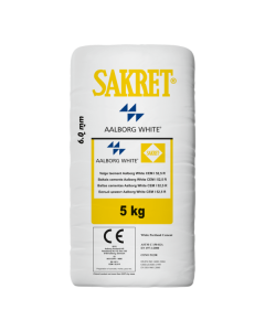 Bright white SAKRET white cement being mixed for high-strength architectural concrete and decorative mortars, highlighting its pure color and light-reflecting properties.