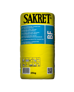 SAKRET BF C25 concrete with antifreeze additive being poured and compacted into formwork for winter construction.