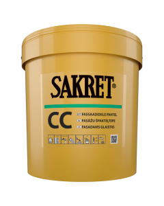White cement-based SAKRET CC facade filler being applied to an exterior mineral wall to create a smooth, vapor-permeable, and frost-resistant finish.