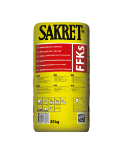 SAKRET FKE gray tile adhesive being applied for floor tiling with underfloor heating and stone facade panels.