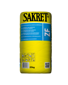 Professional construction site showing winter masonry work with SAKRET ZF cement mortar, illustrating the protective layering of insulation and film over fresh gray brickwork.