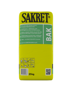 Grey SAKRET BAK adhesive being applied to mineral wool and EPS insulation boards for bonding and reinforcement within a certified ETICS facade system.