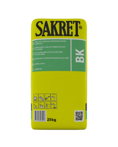 Grey SAKRET BK insulation adhesive being applied to a mineral wool board using the perimeter-and-dab method for secure installation in an ETICS facade system.